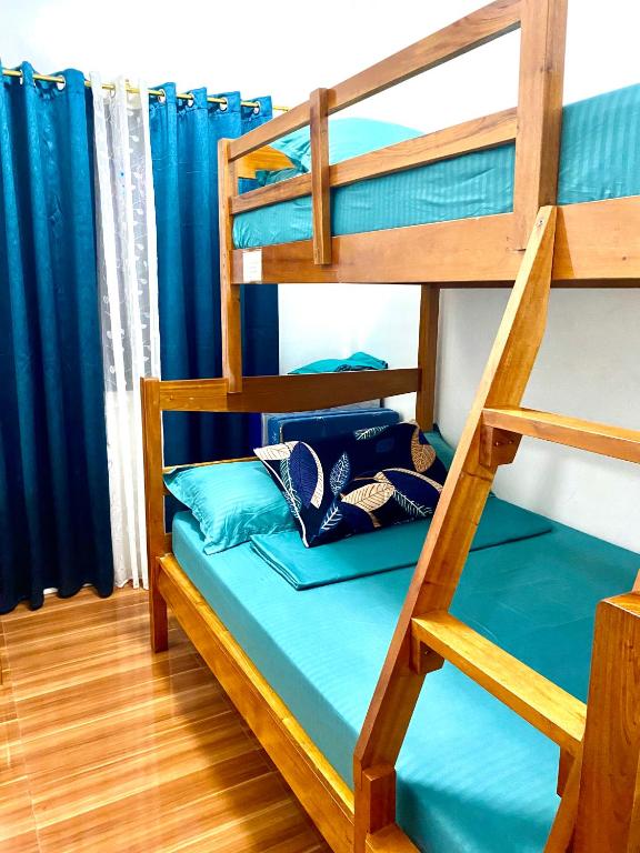 Postel nebo postele na pokoji v ubytování Lucas Transient House