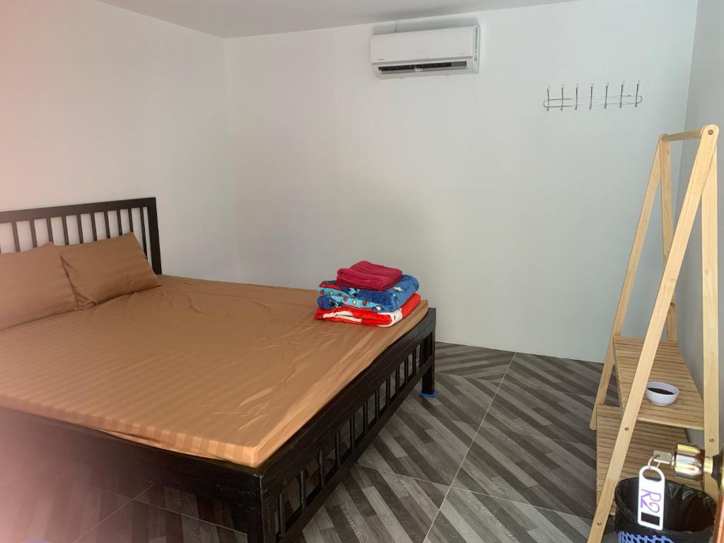 Postel nebo postele na pokoji v ubytování Maloop Cafe Hostel