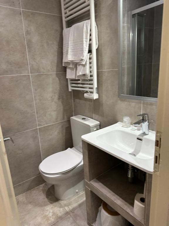 Koupelna v ubytování Hotel Azur