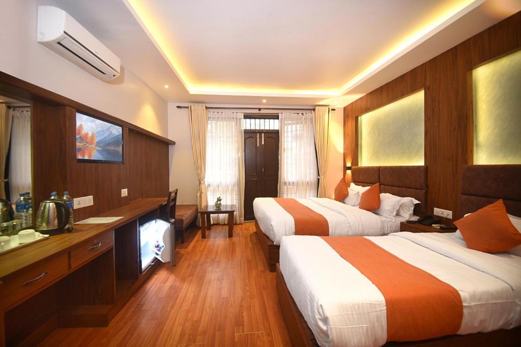 Postel nebo postele na pokoji v ubytování Hotel Mums Home