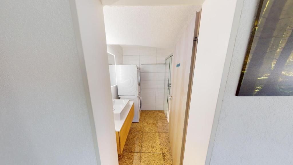 Koupelna v ubytování Solution-Grischun Apartments - Berninaexpress - Städterip - atemberaubende Aussicht