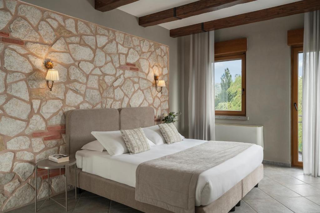 Posteľ alebo postele v izbe v ubytovaní Hotel Don Luis