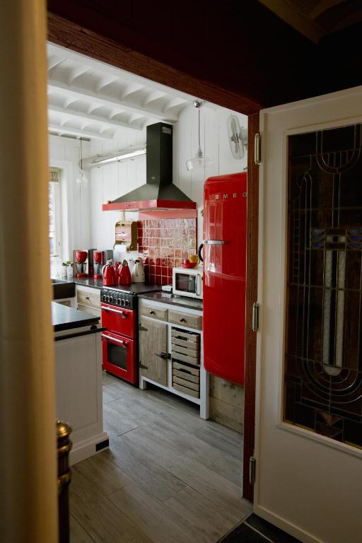 Kuchyň nebo kuchyňský kout v ubytování B&B Hullebrug