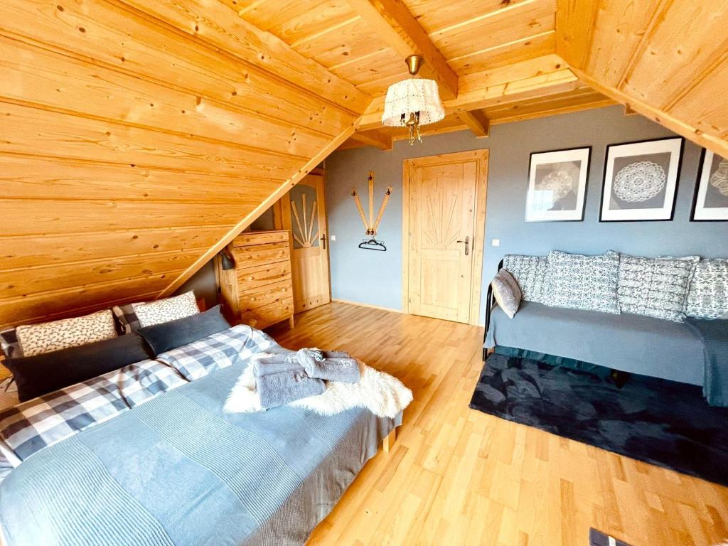 Letto o letti in una camera di Znak Gór