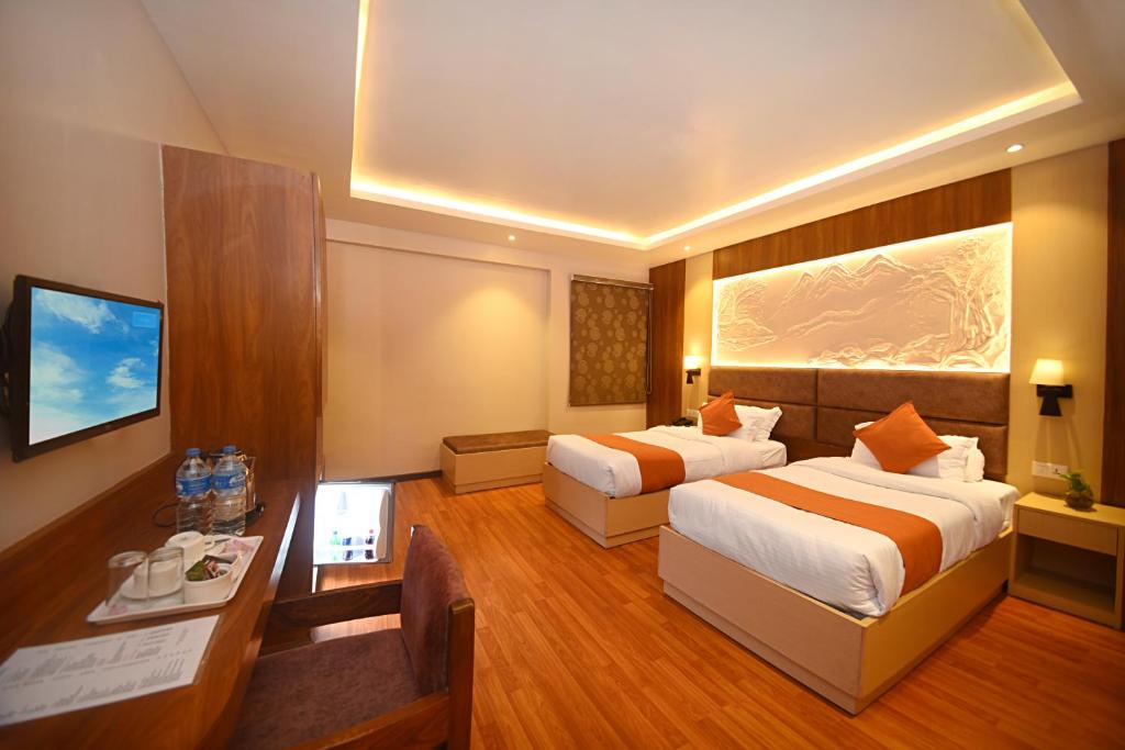 Postel nebo postele na pokoji v ubytování Hotel Mums Home