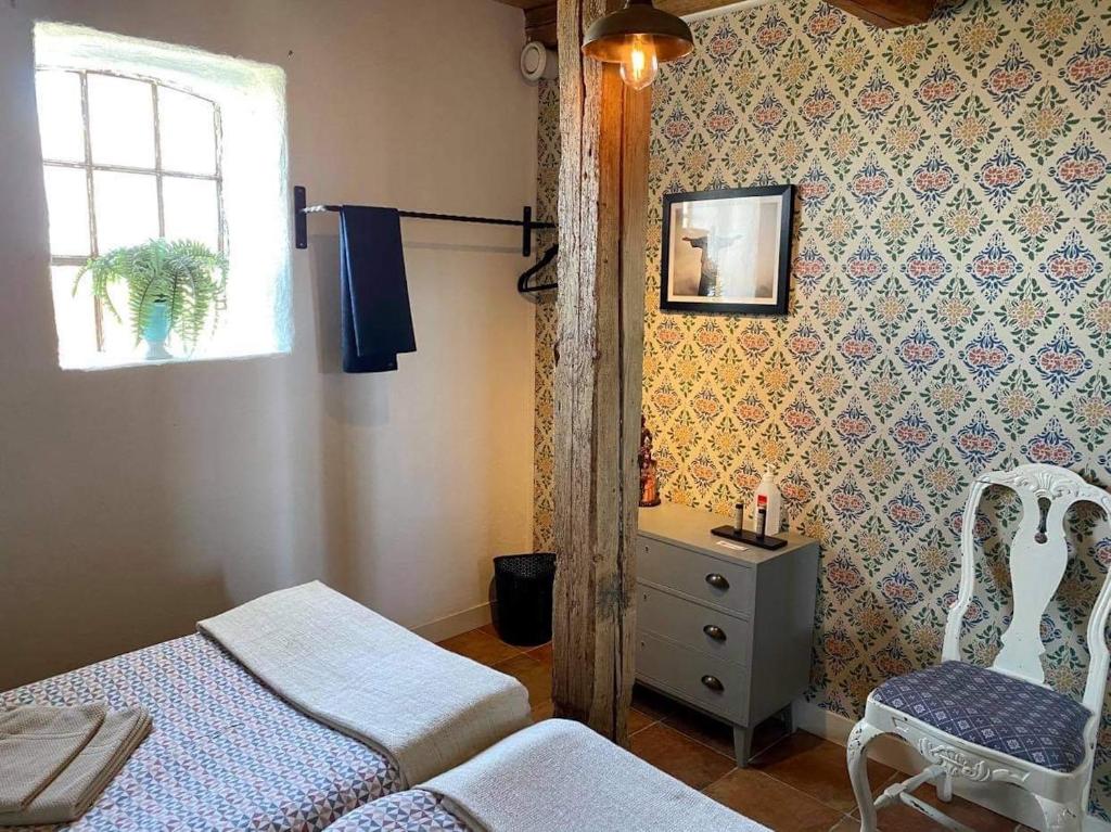 Postel nebo postele na pokoji v ubytování Wingårdhs B&B Österlen