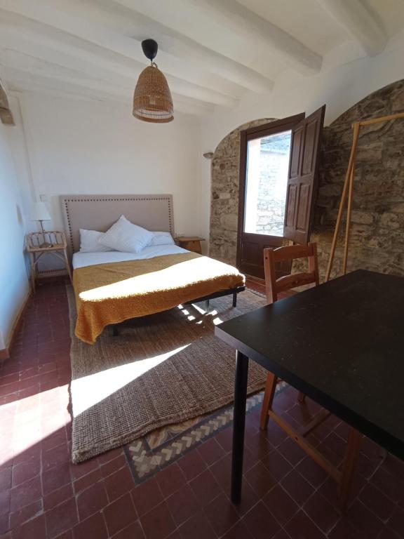 A bed or beds in a room at Casa Pardal Coliving & Coworking
