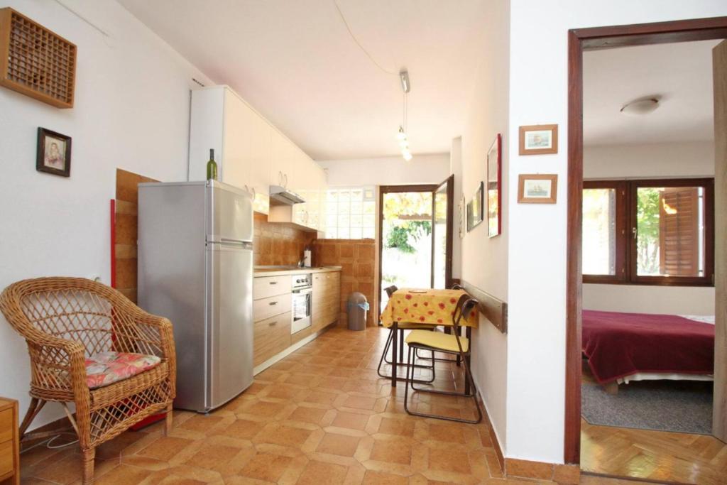 Kuchyňa alebo kuchynka v ubytovaní Apartment Krivec
