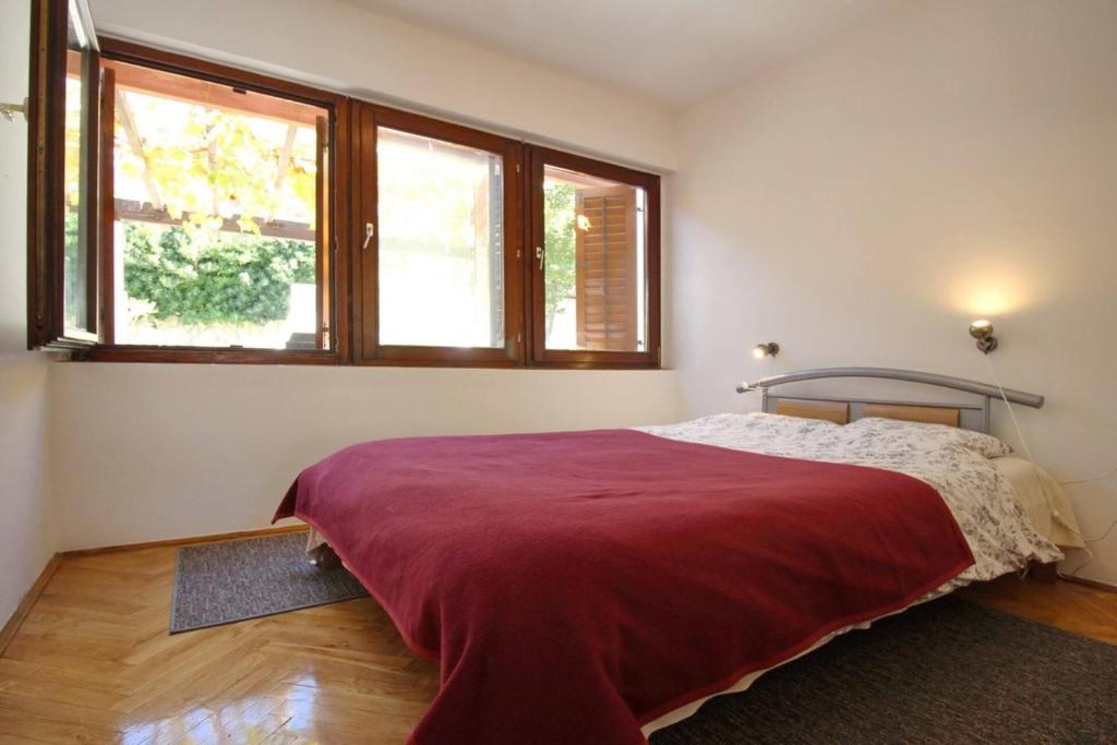 Posteľ alebo postele v izbe v ubytovaní Apartment Krivec