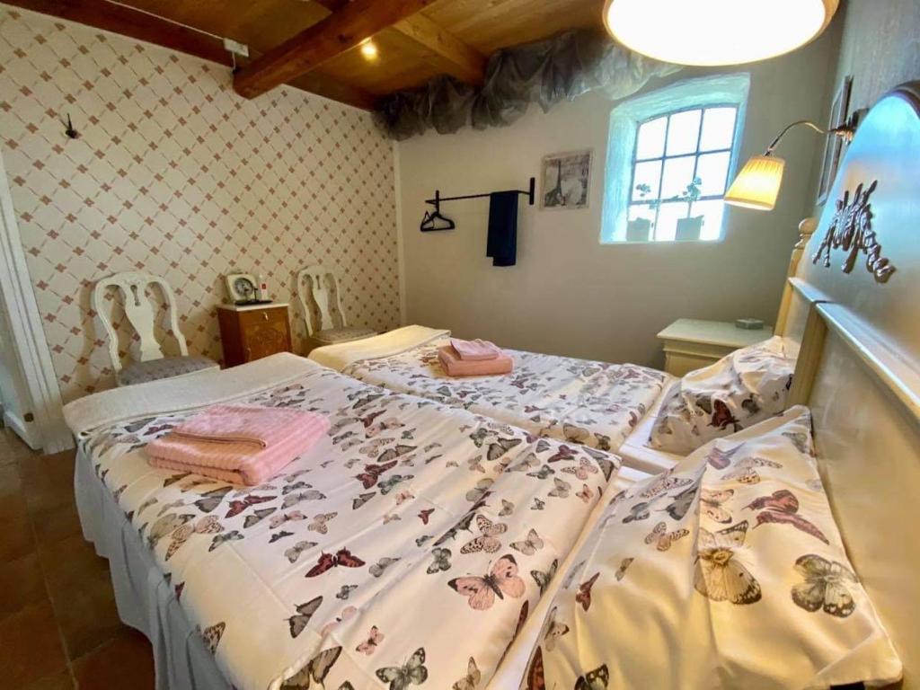 Postel nebo postele na pokoji v ubytování Wingårdhs B&B Österlen