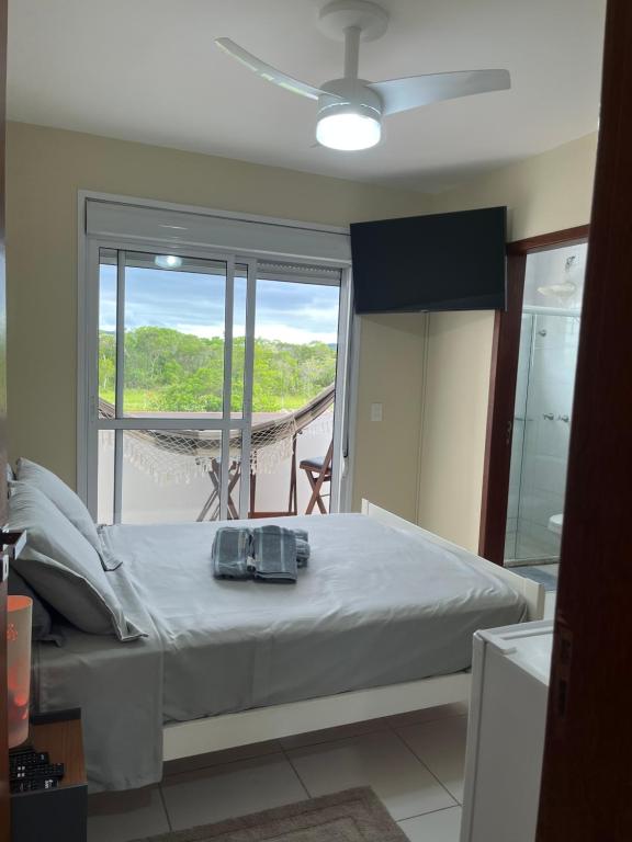 Quarto Suíte de praia Campeche Florianópolis房間的床