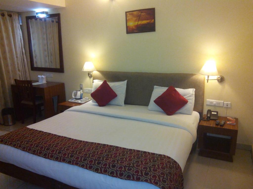 Postel nebo postele na pokoji v ubytování Park Residency Luxury Business Hotel