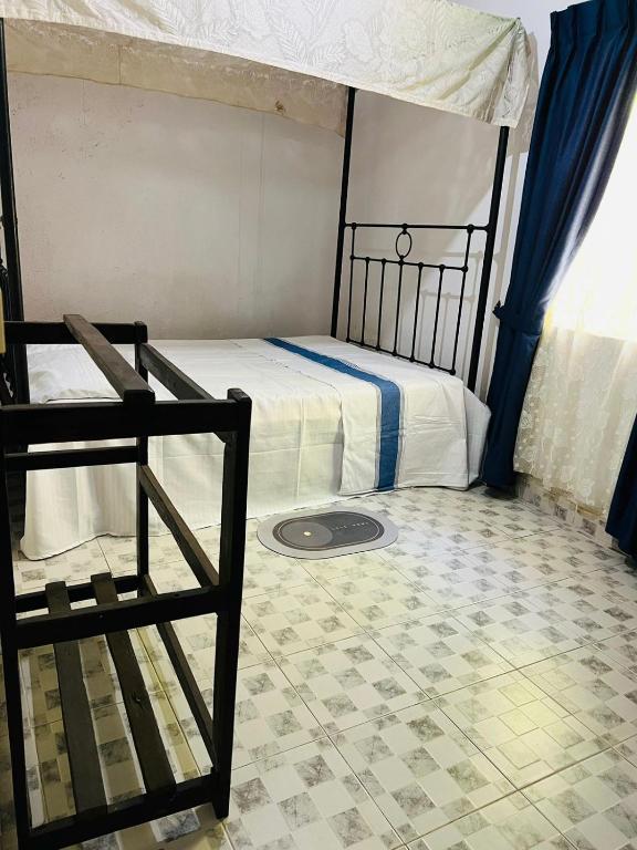 Postel nebo postele na pokoji v ubytování Meeyan Ella Rest