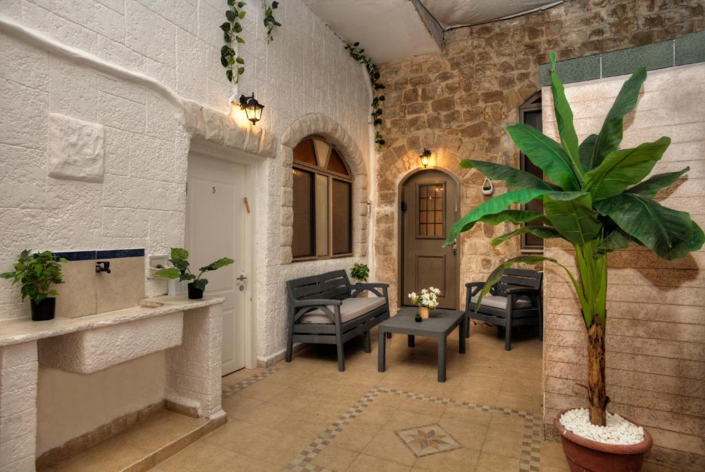 Posezení v ubytování בראשית - סוויטות בוטיק בצפת העתיקה - Beresheet - Boutique Suites in the Old City