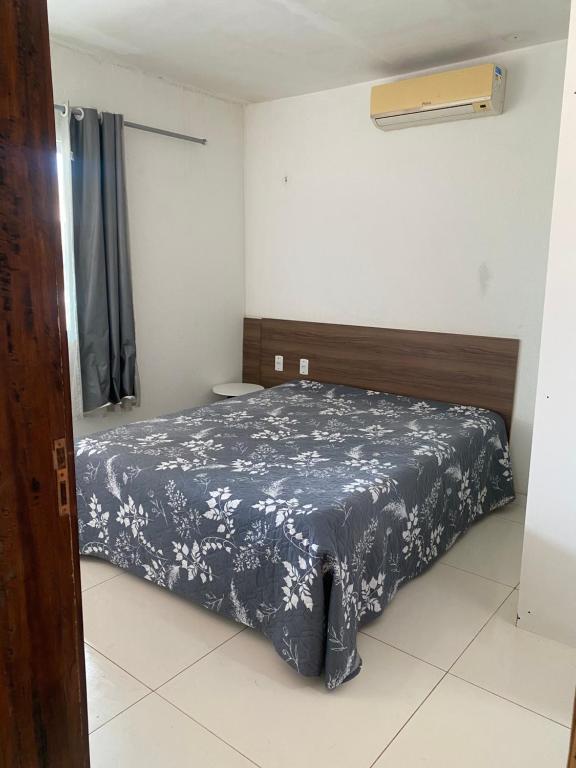 Postel nebo postele na pokoji v ubytování Casa Litorâneo 6