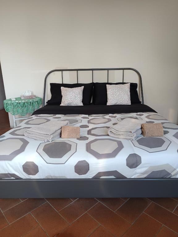 A bed or beds in a room at Panoramic Suite near Duomo and Station