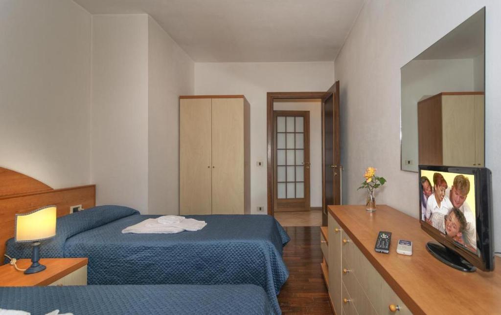 Letto o letti in una camera di Giada Sirio & Giada Orione