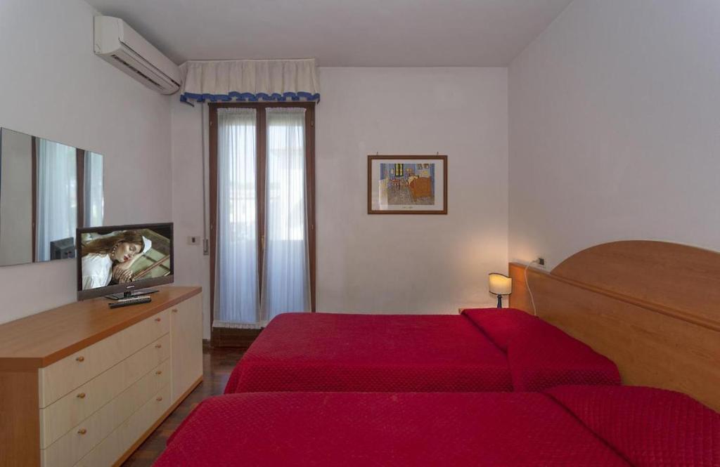 Letto o letti in una camera di Giada Sirio & Giada Orione