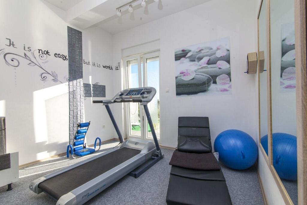 Posilňovňa alebo fitness centrum v ubytovaní House JP