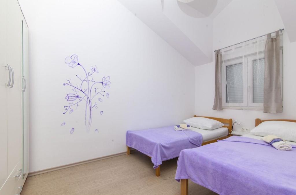 Posteľ alebo postele v izbe v ubytovaní House JP