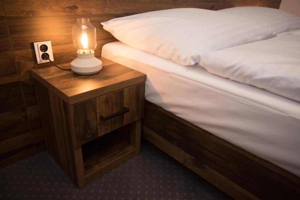 Postel nebo postele na pokoji v ubytování Wellness Hotel Zavadilka