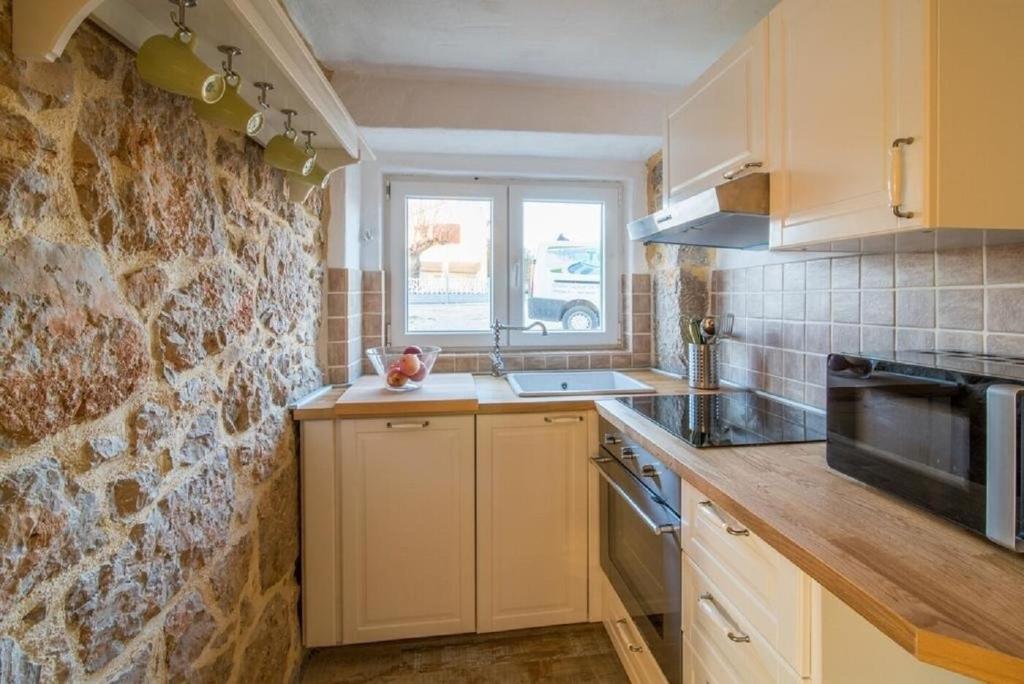 Kuchyňa alebo kuchynka v ubytovaní House Frank