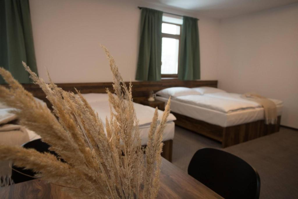 Postel nebo postele na pokoji v ubytování Wellness Hotel Zavadilka