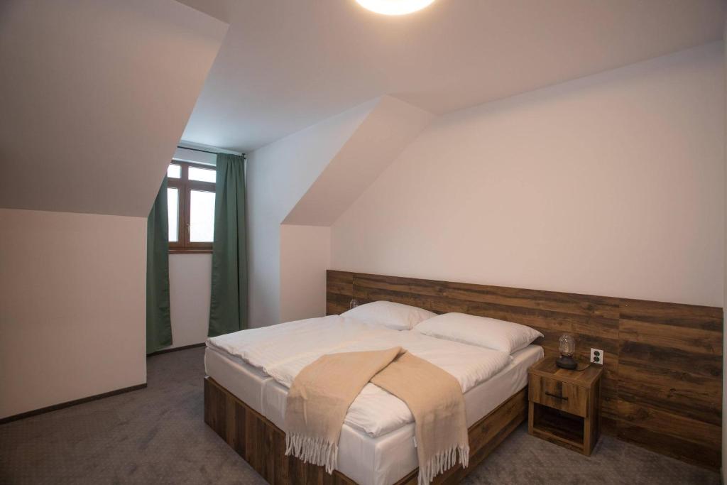 Postel nebo postele na pokoji v ubytování Wellness Hotel Zavadilka