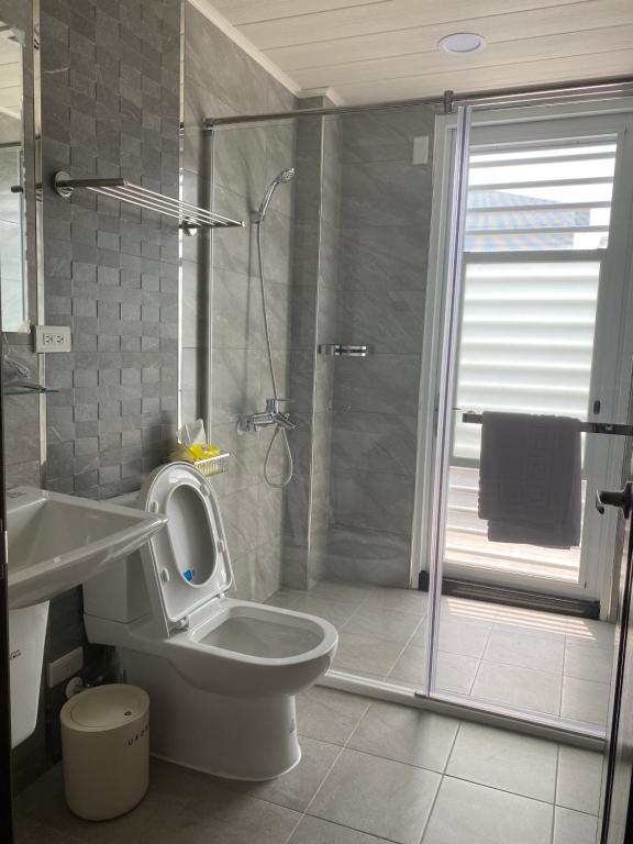 Koupelna v ubytování Orange Homestay