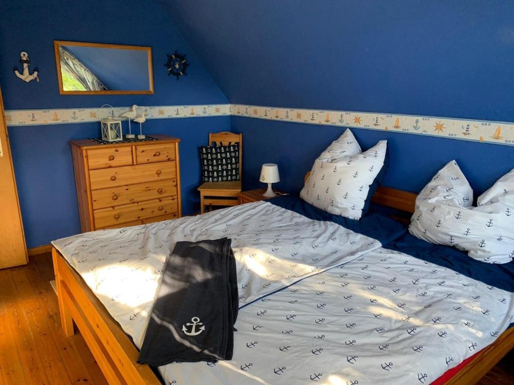 Voodi või voodid majutusasutuse Das NURDACH Haus toas