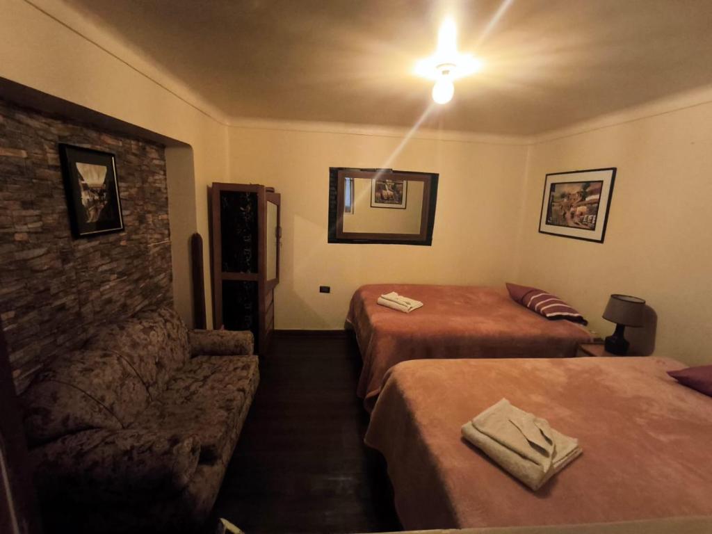 Postel nebo postele na pokoji v ubytování Panay Golden