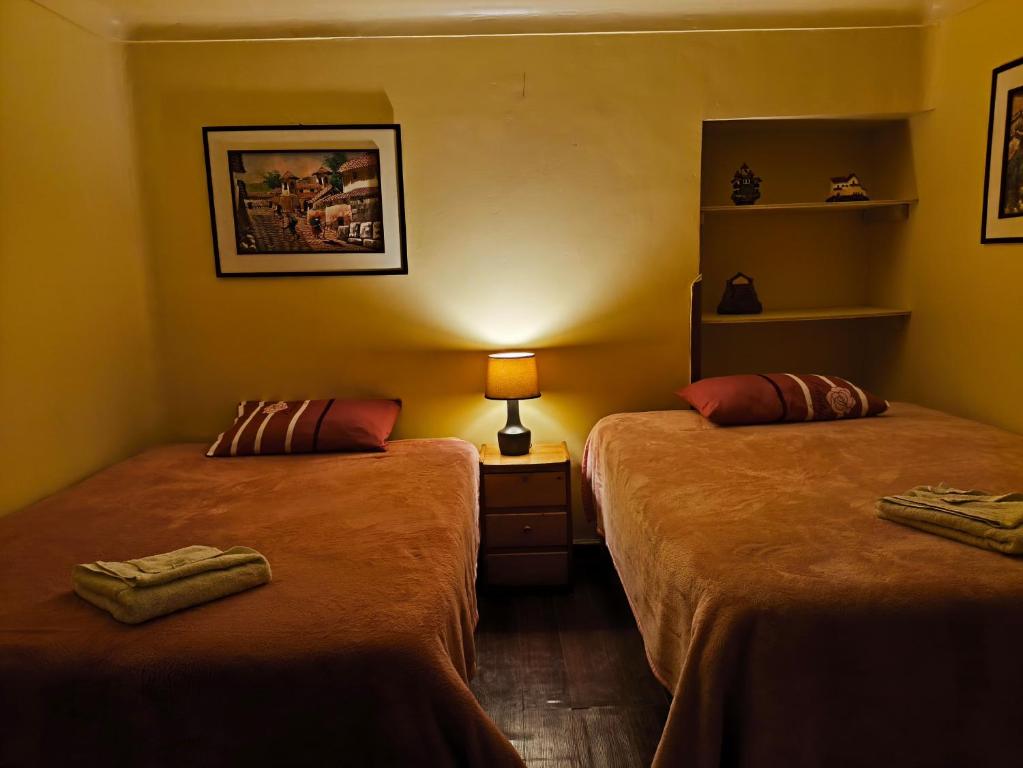 Postel nebo postele na pokoji v ubytování Panay Golden