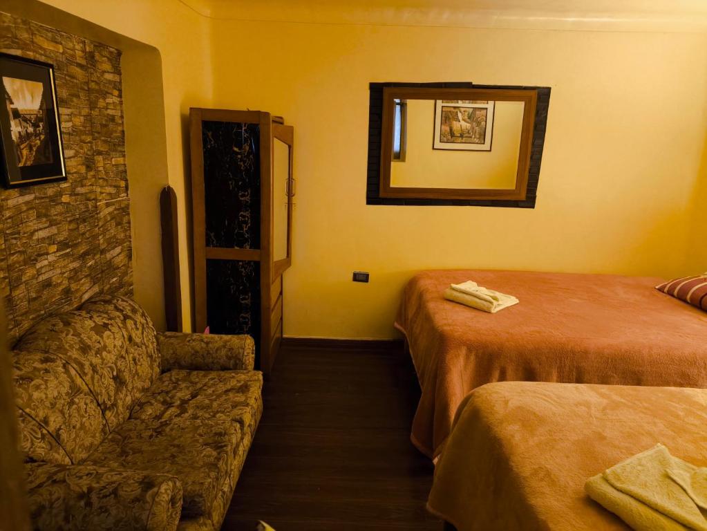 Postel nebo postele na pokoji v ubytování Panay Golden