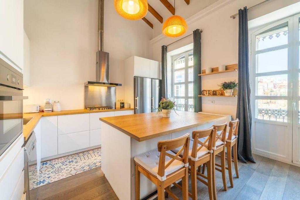 Kuchyňa alebo kuchynka v ubytovaní LovelyLoft Altamira Duplex