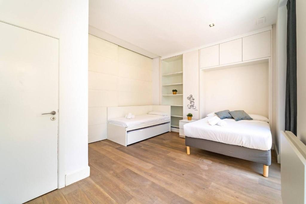 Posteľ alebo postele v izbe v ubytovaní LovelyLoft Altamira Duplex