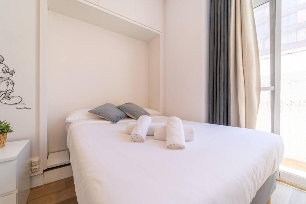 Posteľ alebo postele v izbe v ubytovaní LovelyLoft Altamira Duplex
