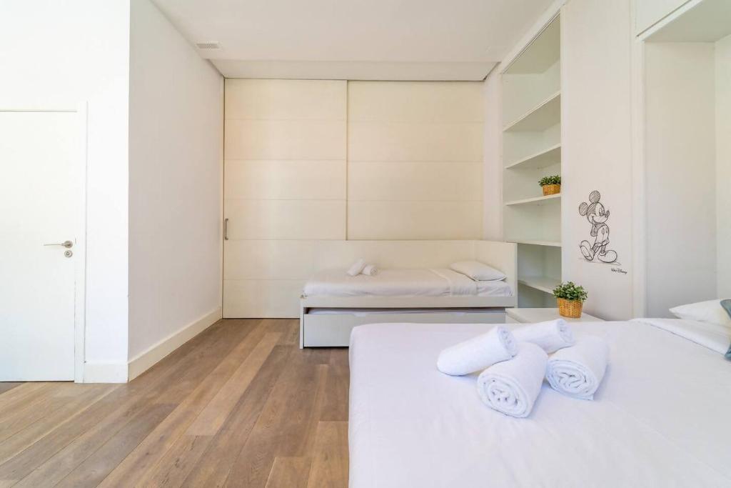 Posteľ alebo postele v izbe v ubytovaní LovelyLoft Altamira Duplex
