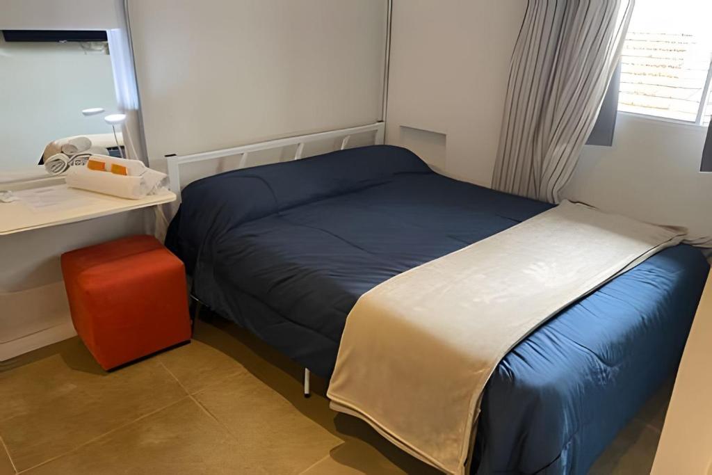 Postel nebo postele na pokoji v ubytování Studiohaus Alvorada