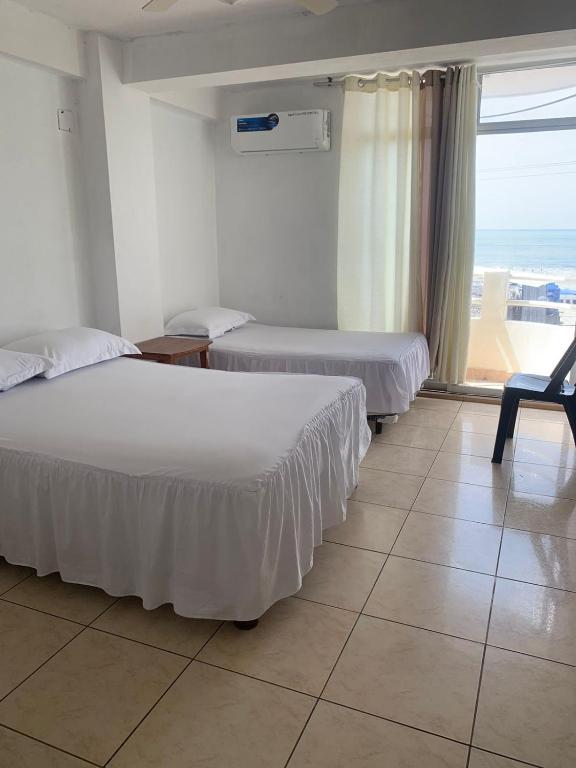 Postel nebo postele na pokoji v ubytování HOTEL PAL-MAR