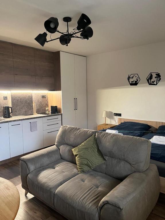Posezení v ubytování IQ Apartments