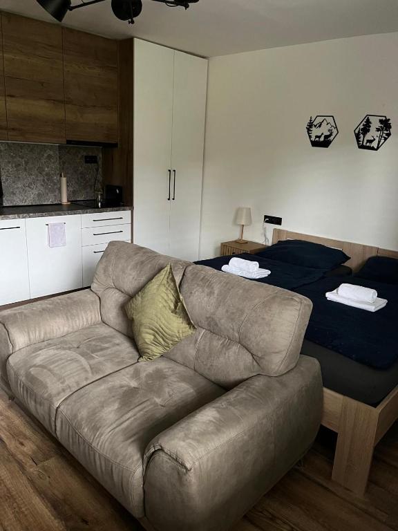 Posezení v ubytování IQ Apartments