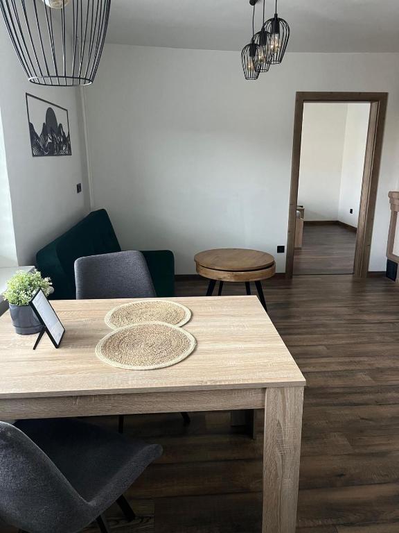Posezení v ubytování IQ Apartments