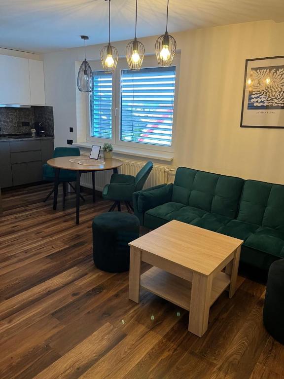Posezení v ubytování IQ Apartments