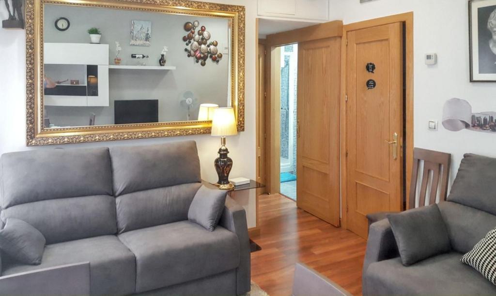 Posezení v ubytování Cosy apartment in the heart of Madrid, 45m², with A/C