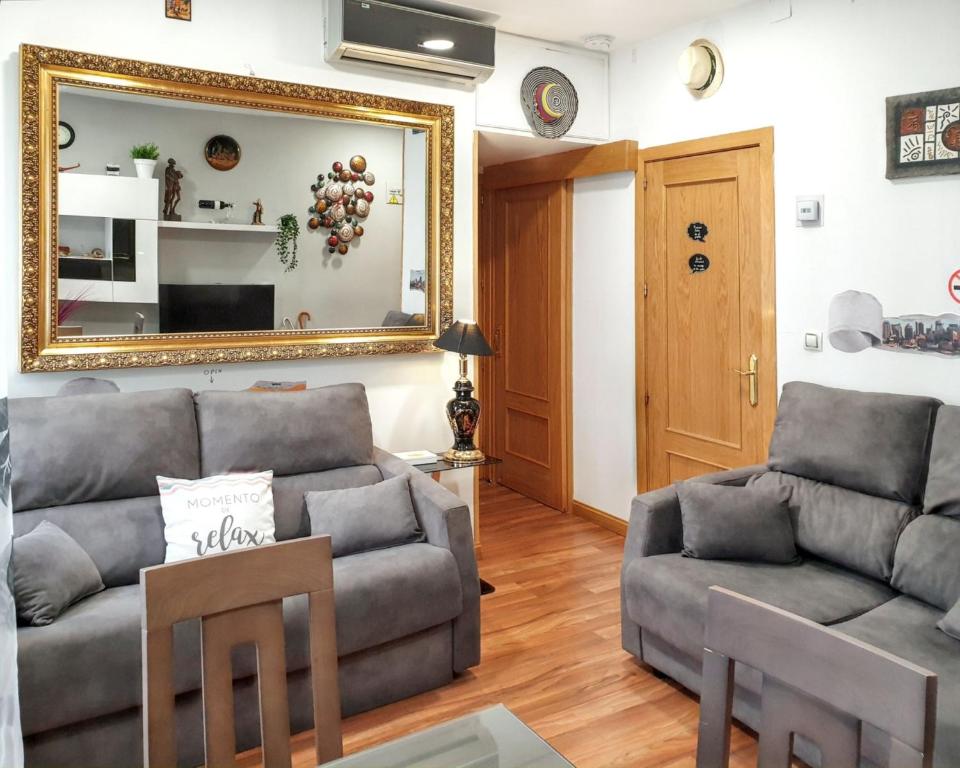 Posezení v ubytování Cosy apartment in the heart of Madrid, 45m², with A/C