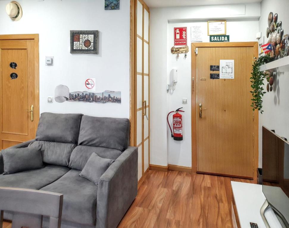 Posezení v ubytování Cosy apartment in the heart of Madrid, 45m², with A/C