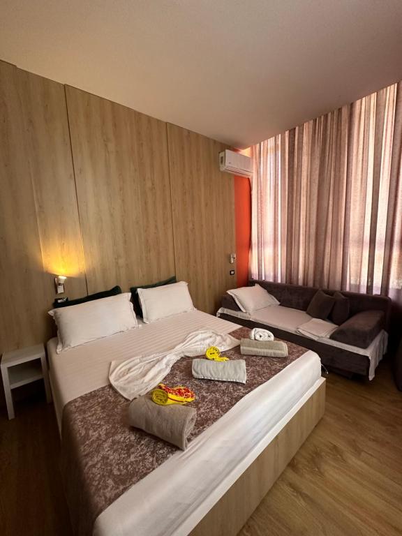 Postel nebo postele na pokoji v ubytování Colombia Apartments&Rooms