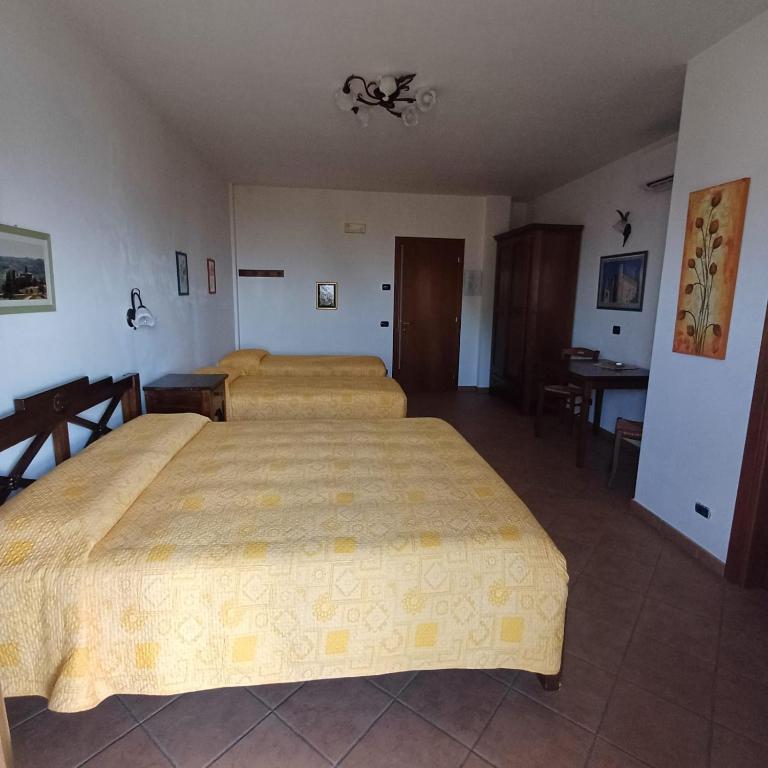 Postel nebo postele na pokoji v ubytování Agriturismo Le Viole