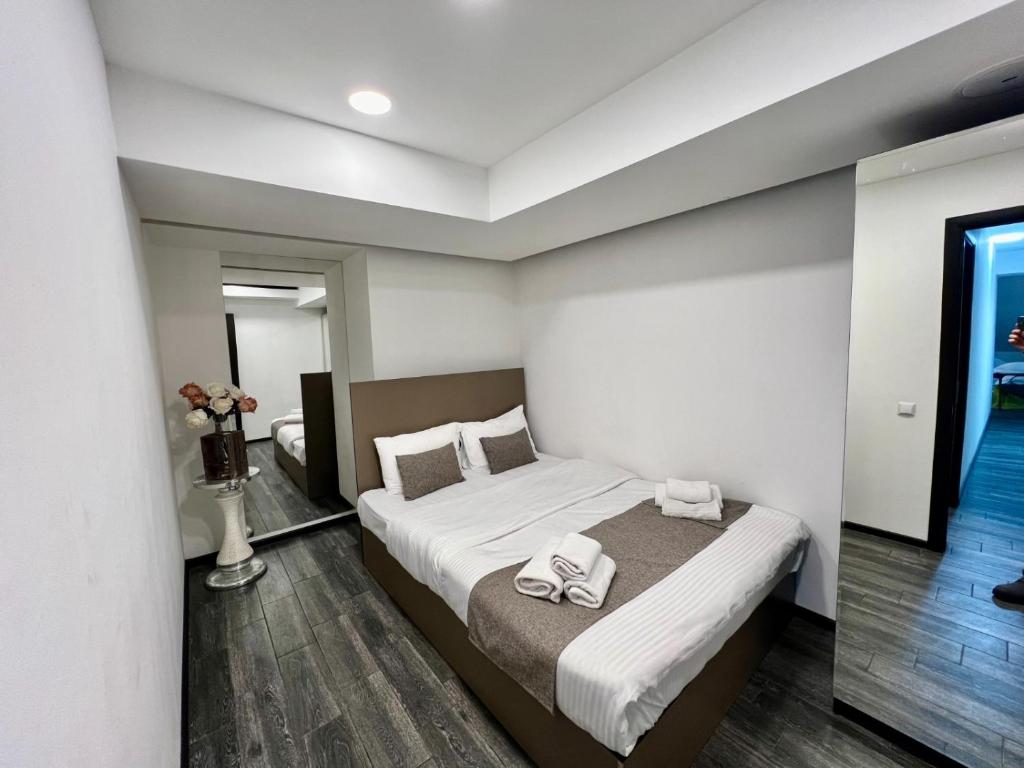 Postel nebo postele na pokoji v ubytování YVN Tumanyan Hotel