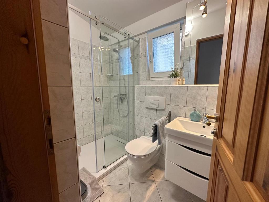 Kúpeľňa v ubytovaní Apartments Bacak